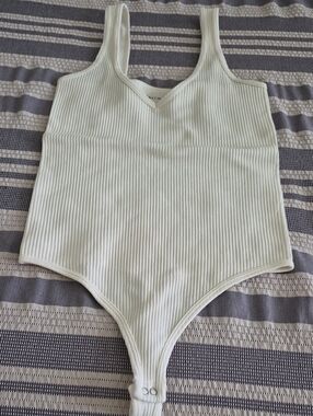Ribbed V-Neck Bodysuit in Cream